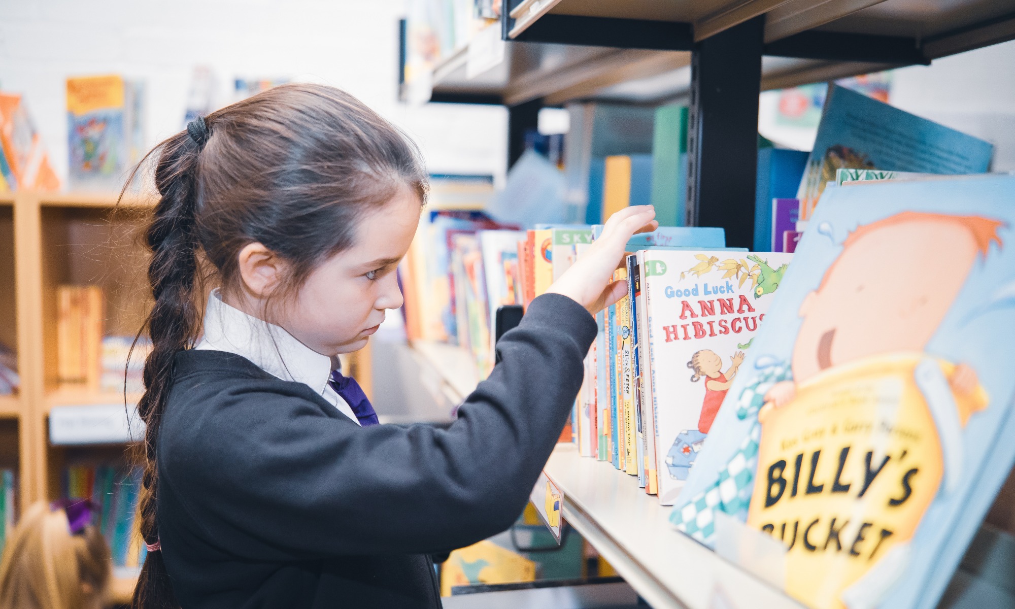 Pupil with books